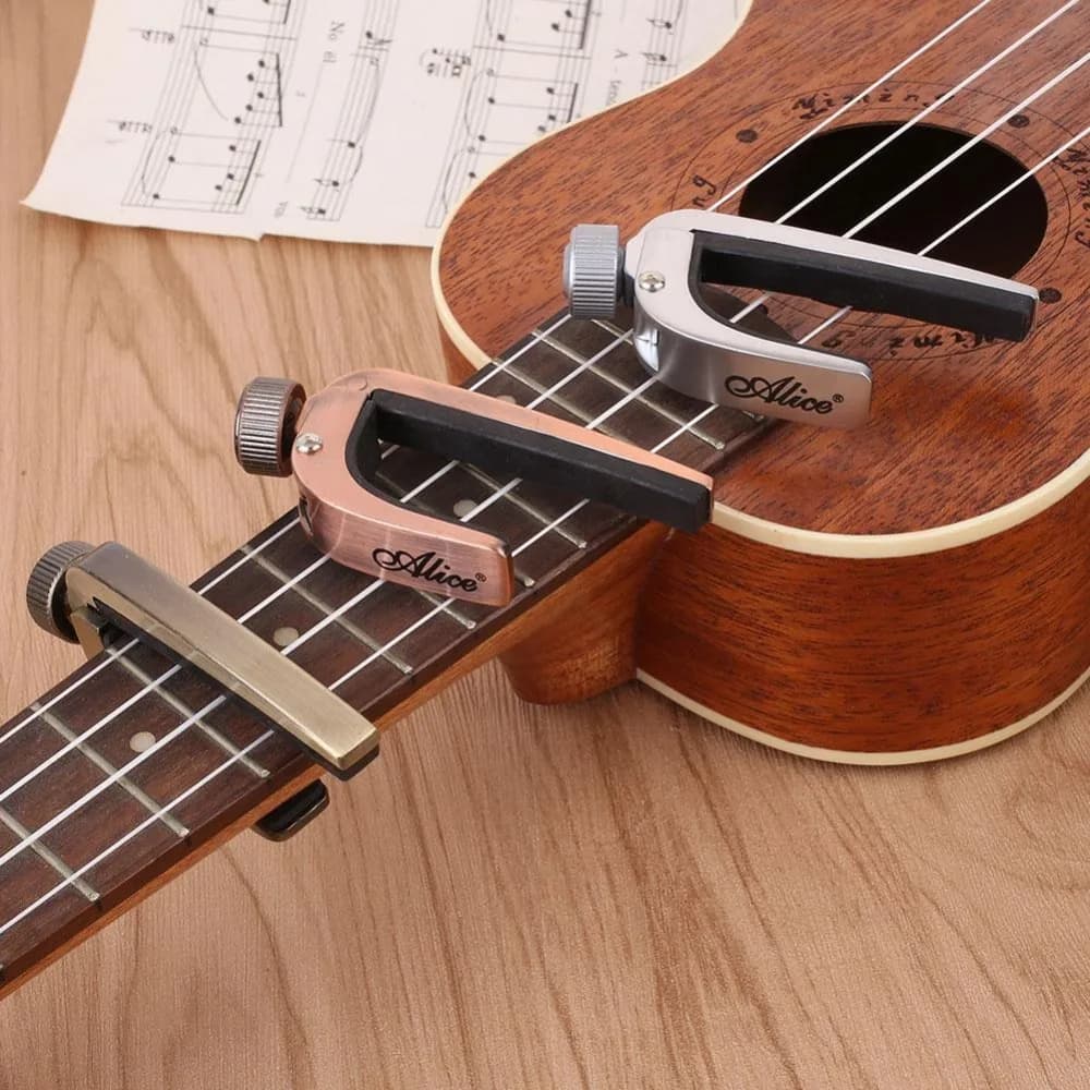 Capotas de guitarra elétrica acústica capo baixo violino ukulele capotraste braçadeira de afinação de uma mão gatilho 3 cores capo de metal