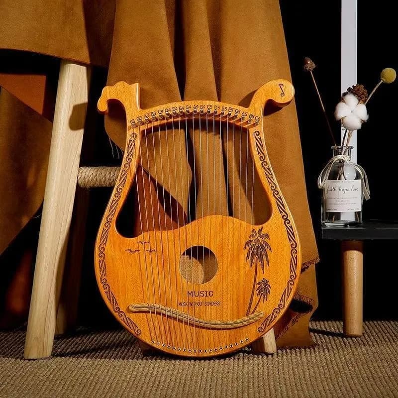 Harpa de madeira com 19 cordas para iniciantes, design clássico com detalhes esculpidos, cor marrom claro.