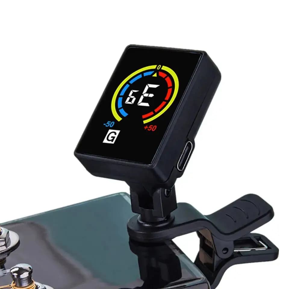 Afinador de guitarra micro com display digital e interface USB, montado em um clipe preto