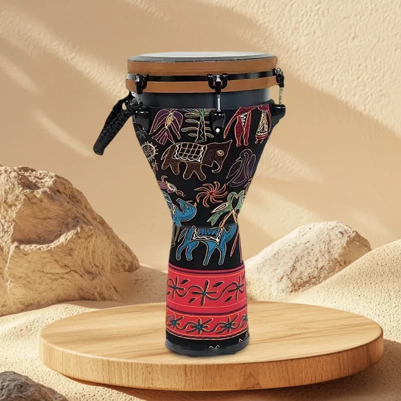 Tambor africano profissional 10 polegadas com desenhos culturais, areia e rochas no fundo