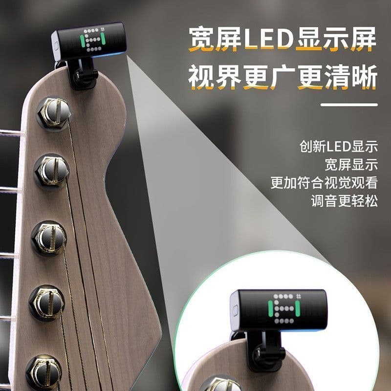 Afinador de guitarra eletrônico preto com visor LED verde montado na cabeça de uma guitarra.