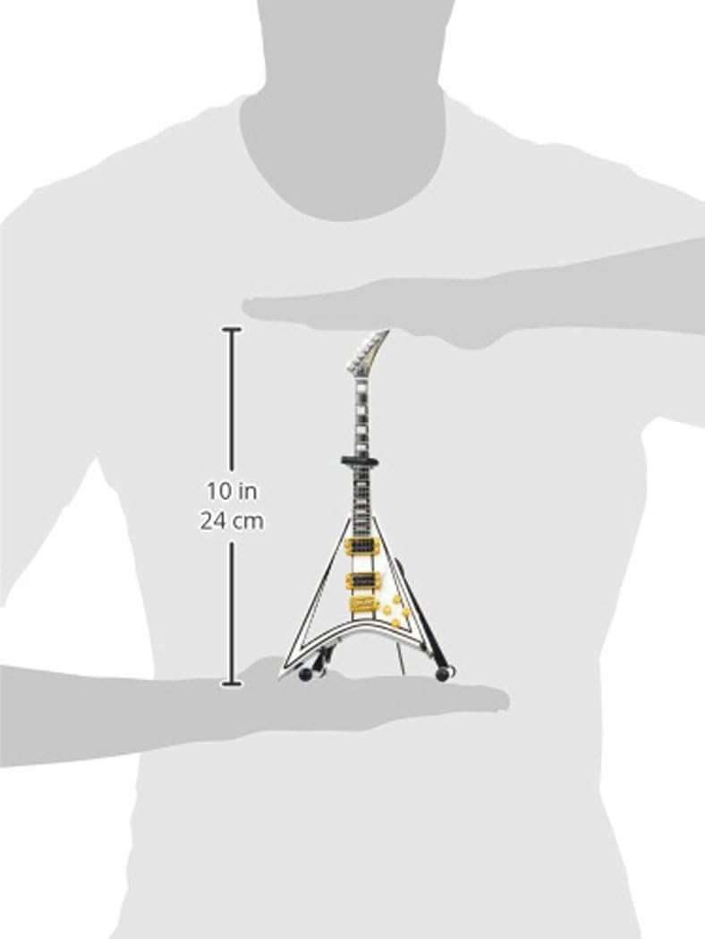 Pessoa segurando mini guitarra decorativa Flying V branca para mostrar tamanho de 24 cm