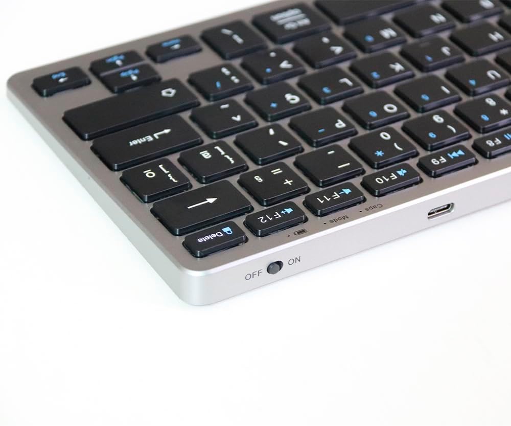 Teclado Hrebos Bluetooth com botão de ligar/desligar e entrada USB-C visíveis.