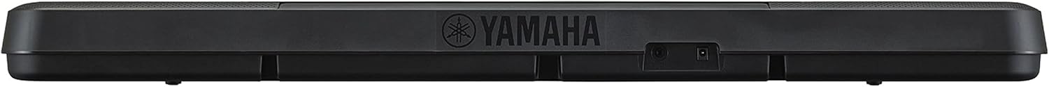 Parte traseira do teclado digital Yamaha PSR-F52 com entrada para fonte e logo Yamaha.