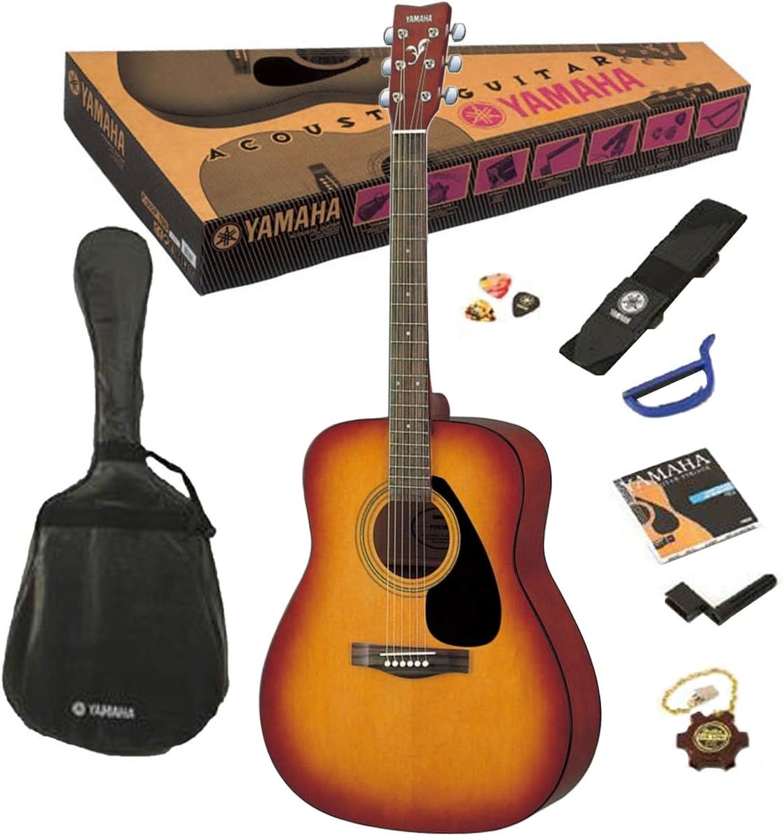 Violão Yamaha F310P Tobacco Brown Sunburst com capa, palhetas, afinador, chave de afinação, cordas reserva e alça preta.