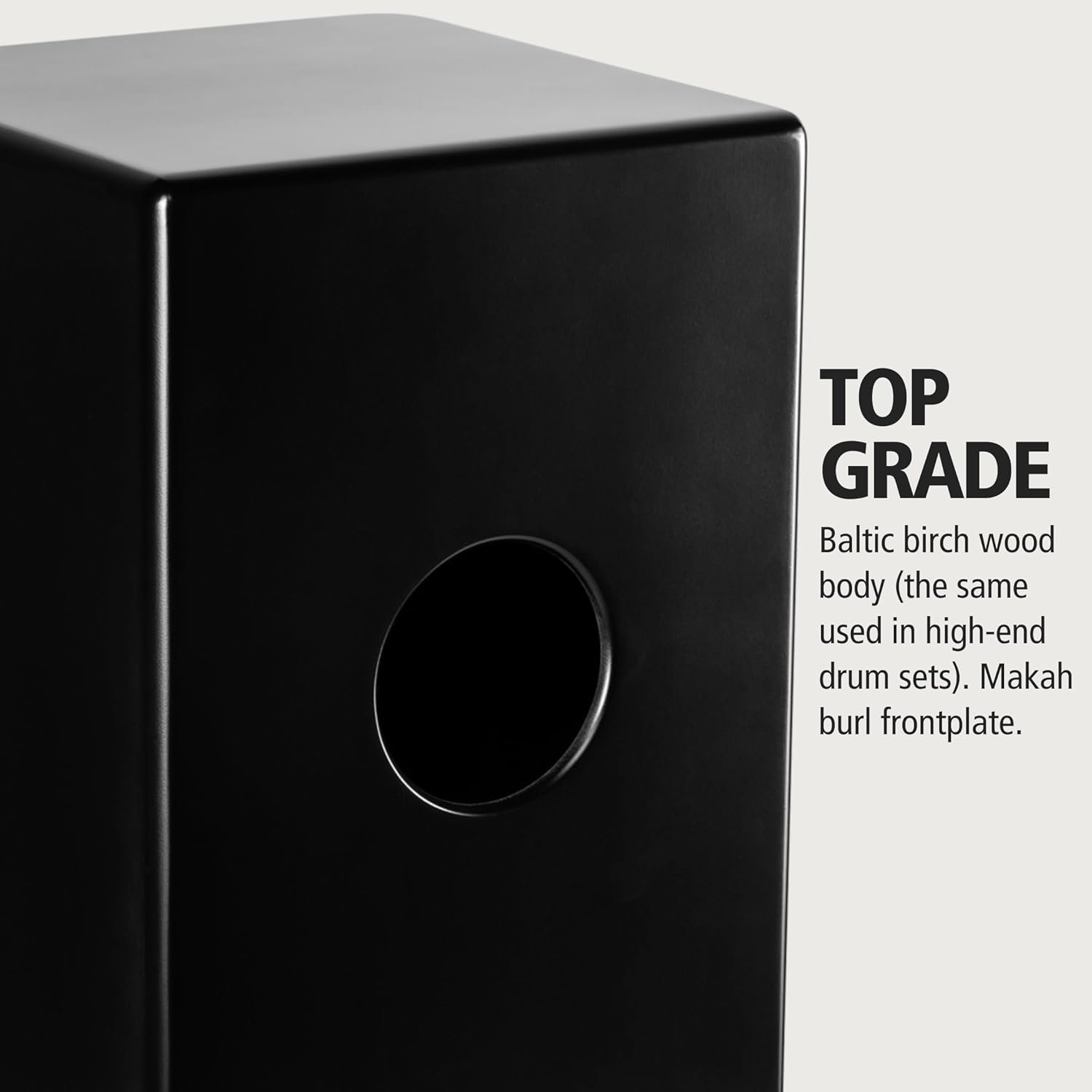 Parte traseira do cajon Meinl PWCP100MB mostrando orifício circular e descrição de madeira de bétula báltica e frente Makah burl