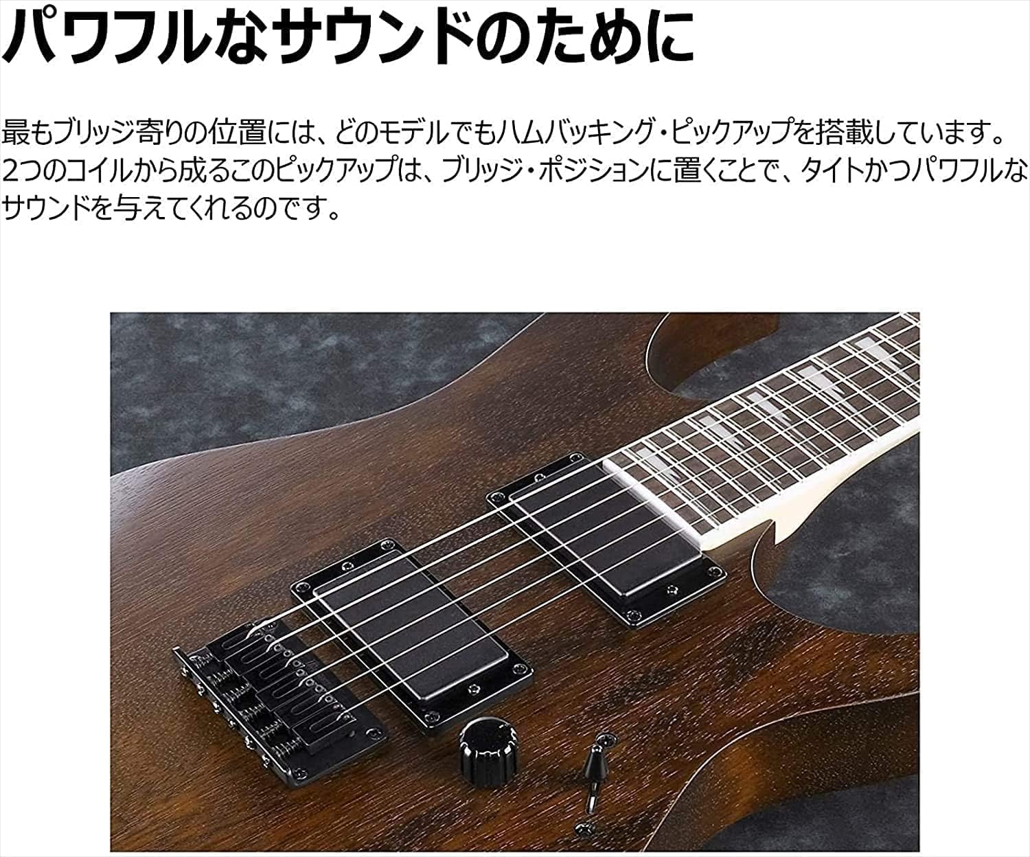 Detalhe dos captadores humbucker da guitarra Ibanez Gio GRG 121DX com acabamento Walnut Flat e texto em japonês.