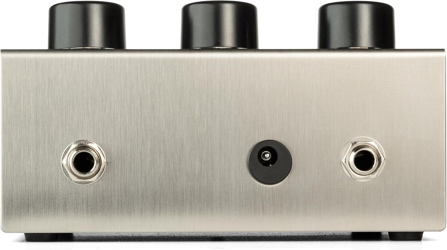 Parte traseira do pedal Electro-Harmonix Big Muff PI prata mostrando conexões e botões pretos.