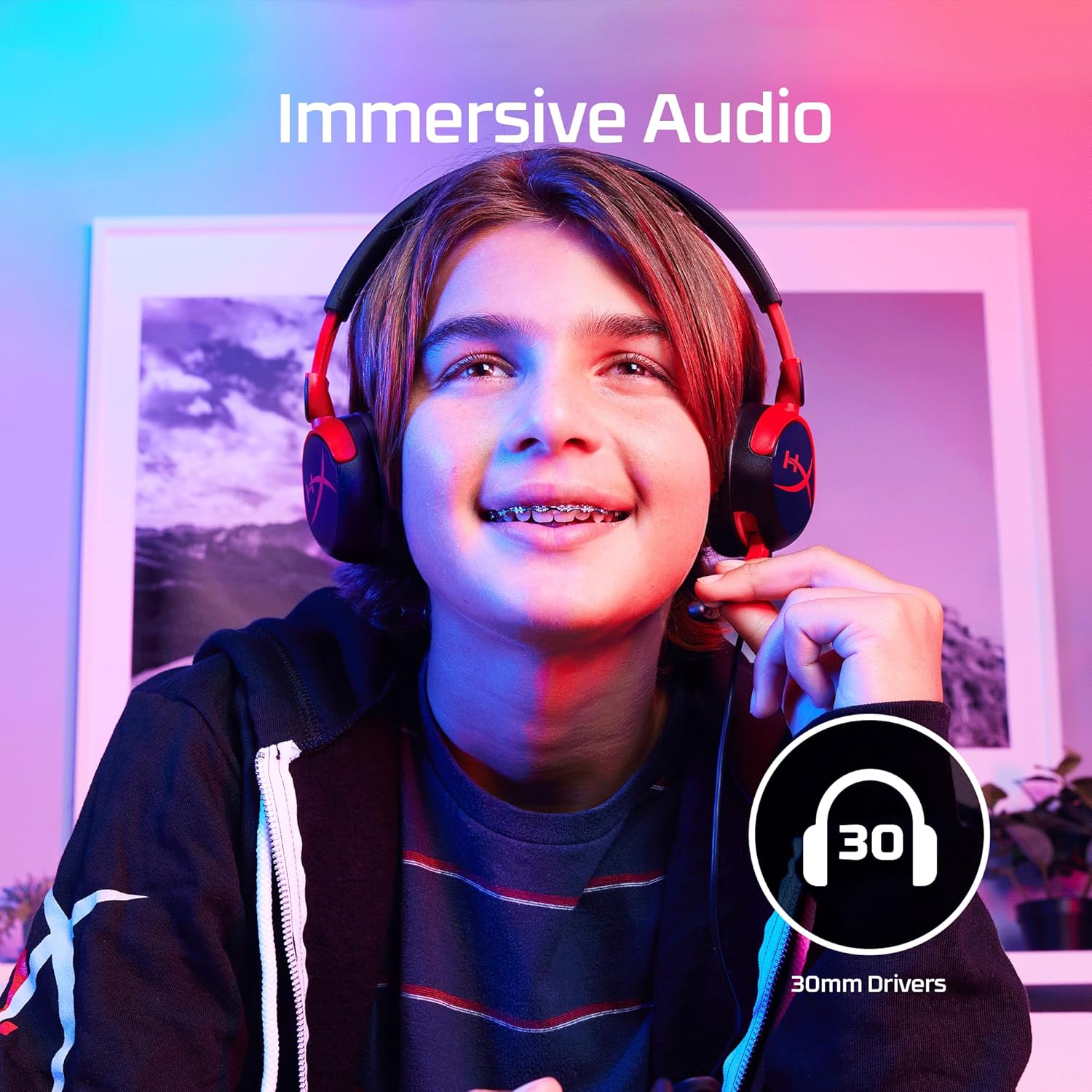Person wearing HyperX Cloud Mini headphones showcasing immersive audio with 30mm drivers